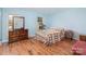 Bright bedroom with a beautiful window and a spacious wooden dresser at 109 Terrace Pl, Lincolnton, NC 28092
