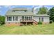 Charming two-story home featuring a welcoming deck and well-maintained lawn at 109 Terrace Pl, Lincolnton, NC 28092