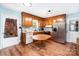Functional kitchen featuring wood cabinets, stainless steel appliances, and a cozy dining table at 109 Terrace Pl, Lincolnton, NC 28092