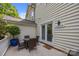Private patio with outdoor seating provides a perfect spot for relaxation and enjoying outdoor meals at 11139 Dundarrach Ln, Charlotte, NC 28277