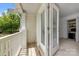 Cozy balcony view showcasing the transition from indoor comfort to outdoor serenity at 11139 Dundarrach Ln, Charlotte, NC 28277