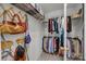 Walk-in closet with ample shelving and hanging space for organized storage at 11139 Dundarrach Ln, Charlotte, NC 28277