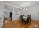 Cozy dining area with view to the kitchen and living area at 11139 Dundarrach Ln, Charlotte, NC 28277