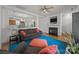 Comfortable living room featuring a fireplace and open access to the kitchen at 11139 Dundarrach Ln, Charlotte, NC 28277
