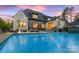 Inviting backyard with a large pool and lounge chairs, perfect for relaxation and entertainment near the home at 1118 Jefferson Dr, Charlotte, NC 28270