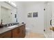 Bathroom featuring a wood vanity with gray countertop and a glass enclosed shower at 1118 Jefferson Dr, Charlotte, NC 28270