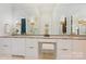 A modern bathroom features dual sinks, vanity with ample storage and a large mirror at 1118 Jefferson Dr, Charlotte, NC 28270