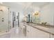 Bright bathroom with double sinks, a large mirror, and a glass enclosed shower at 1118 Jefferson Dr, Charlotte, NC 28270