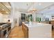 Gourmet kitchen with a large center island, stainless steel appliances, and open dining area for Gathering and entertaining at 1118 Jefferson Dr, Charlotte, NC 28270