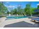Beautiful backyard swimming pool and hot tub, surrounded by a private landscaped yard at 1118 Jefferson Dr, Charlotte, NC 28270