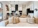 Cozy living room with stylish seating and a peek into the modern kitchen area at 1123 Fern Hill Rd, Mooresville, NC 28117