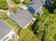 Aerial view of a home with a well-maintained backyard, deck and mature landscaping in a residential area at 1151 Donelea Nw Ln, Concord, NC 28027