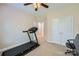 Bedroom with neutral carpet and a ceiling fan with access to additional rooms at 1151 Donelea Nw Ln, Concord, NC 28027