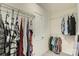 Walk-in closet with ample storage space and racks, ideal for organizing clothes and accessories at 1151 Donelea Nw Ln, Concord, NC 28027