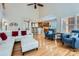 Bright and spacious living room open to kitchen with hardwood floors and white furniture at 1151 Donelea Nw Ln, Concord, NC 28027