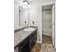 Well-lit bathroom featuring granite countertop and great vanity at 117 Tom Sawyer Ln, Mount Holly, NC 28120