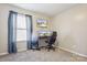 Bedroom featuring double door closet, TV, and desk at 117 Tom Sawyer Ln, Mount Holly, NC 28120