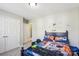 Stylized bedroom with gaming theme and double door closet at 117 Tom Sawyer Ln, Mount Holly, NC 28120