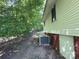 Exterior shot showing siding, an air conditioner unit, and brick foundation at 12719 Cottonville Rd, Norwood, NC 28128