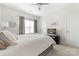 Tranquil bedroom with neutral decor, a full-sized bed, and ample natural light at 132 Moores Branch Rd, Mount Holly, NC 28120