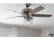 Modern ceiling fan with attached light fixtures, providing both cooling and illumination in a stylish design at 132 Moores Branch Rd, Mount Holly, NC 28120