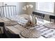 Charming dining table setting with decorative placemats, a striped runner, and modern accessories, ready for entertaining at 132 Moores Branch Rd, Mount Holly, NC 28120