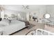 Large main bedroom featuring a vanity, tv, and a cozy sitting area at 132 Moores Branch Rd, Mount Holly, NC 28120