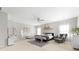 Bright main bedroom with a large bed, cozy chair, and ample natural light at 132 Moores Branch Rd, Mount Holly, NC 28120