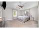 Inviting bedroom with soft carpet, neutral walls, ceiling fan, and a full size bed at 1336 26Th Ne Ave, Hickory, NC 28601