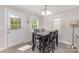 Bright dining area featuring a table for six with access to an outdoor patio at 1336 26Th Ne Ave, Hickory, NC 28601