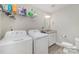 Functional laundry room and half bath with new washer, dryer, and vanity at 1336 26Th Ne Ave, Hickory, NC 28601