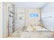 Modern bathroom featuring a glass-enclosed shower, soaking tub, and stylish fixtures at 1421 Lyon Ct, Charlotte, NC 28205