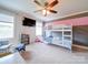 Charming bedroom features a bunk bed, soft carpet, and natural light creating a cozy space at 1421 Lyon Ct, Charlotte, NC 28205