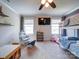This bedroom features a bunk bed, a rocking chair, and soft carpet at 1421 Lyon Ct, Charlotte, NC 28205