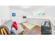 Cozy bonus room with a futon, TV, and a unique play area with a piano at 1421 Lyon Ct, Charlotte, NC 28205