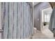 Bathroom featuring a gray shower curtain with neutral tiling at 1446 Cilantro Ct, Tega Cay, SC 29708