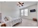 Bedroom featuring a ceiling fan, carpeted floor, and mounted TV at 1446 Cilantro Ct, Tega Cay, SC 29708