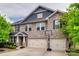 Beautiful two-story brick home with a two-car garage and well-maintained landscaping at 1446 Cilantro Ct, Tega Cay, SC 29708