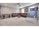 Finished basement with a plush sectional sofa, an air hockey table, and basketball game at 1446 Cilantro Ct, Tega Cay, SC 29708