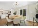Bright dining area with natural light offers a seamless indoor/outdoor flow with access to the backyard at 145 Burton Hills Cir, Gastonia, NC 28054