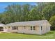 A charming home featuring neutral-toned brick and vinyl siding complemented by a well-maintained lawn at 145 Burton Hills Cir, Gastonia, NC 28054