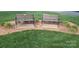 Community benches for resting near landscaped areas provide relaxation and enjoyment of the area at 15326 Carrington Ridge Dr, Huntersville, NC 28078