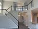 Spacious foyer features hardwood floors and a staircase leading to the second floor at 15326 Carrington Ridge Dr, Huntersville, NC 28078