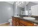 Bathroom featuring double sinks, vanity, and a large mirror at 1618 33Rd Ne Ave # 1, Hickory, NC 28601