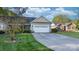 Residential house featuring a well-kept lawn and concrete driveway leading to the attached garage at 1618 33Rd Ne Ave # 1, Hickory, NC 28601