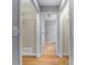 Hallway with views of bathroom and walk-in closets with shelving at 1618 33Rd Ne Ave # 1, Hickory, NC 28601