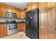 Kitchen featuring wooden cabinets, stainless steel appliances, and ample storage space at 1618 33Rd Ne Ave # 1, Hickory, NC 28601