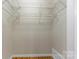 Walk-in closet with white wire shelving and hardwood floors at 1618 33Rd Ne Ave # 1, Hickory, NC 28601