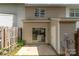 A patio area with a slider, and a fenced-in backyard, offering privacy and outdoor enjoyment at 1720 Forest Side Ln, Charlotte, NC 28213