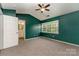 Bedroom with high ceilings, and a connecting bathroom at 1720 Forest Side Ln, Charlotte, NC 28213